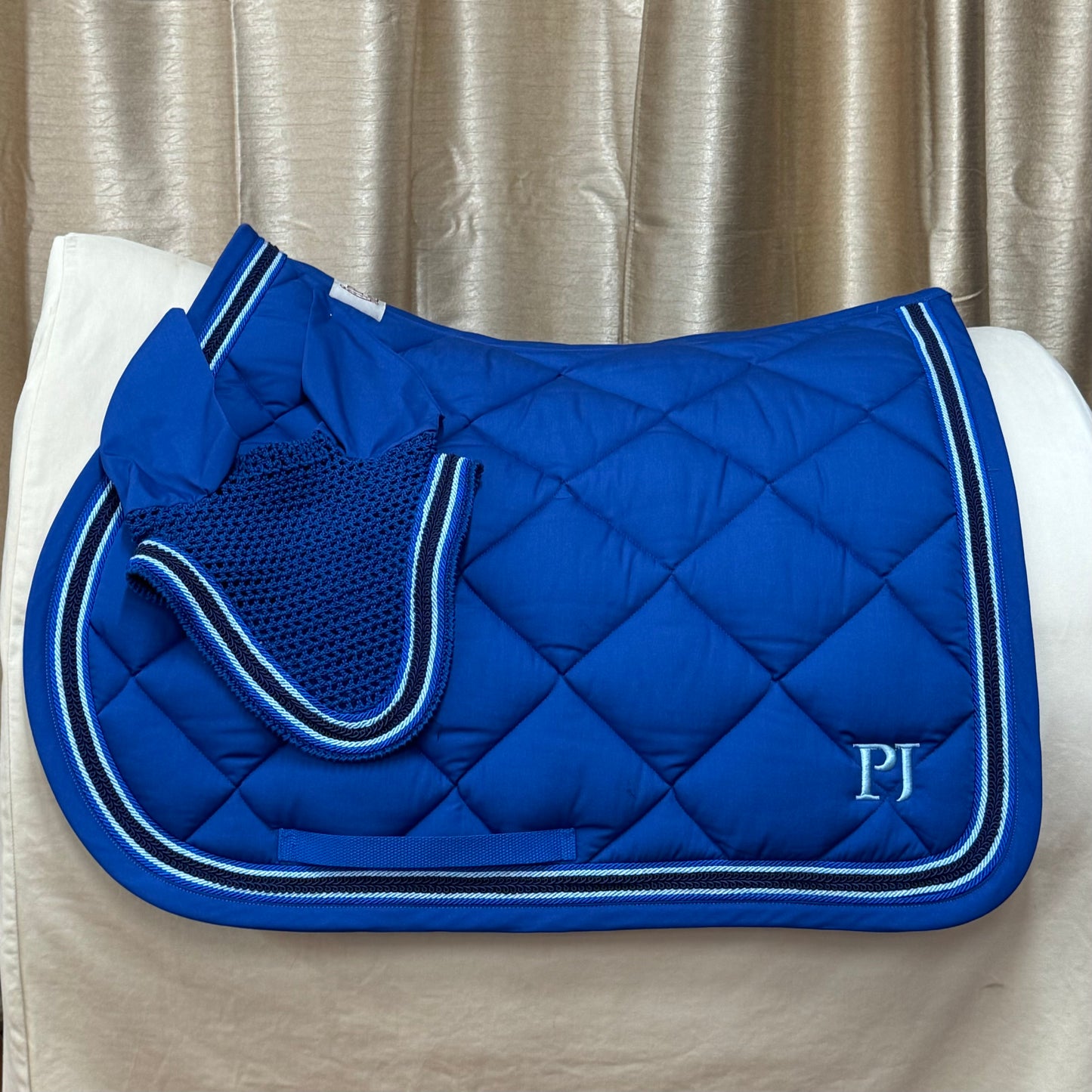 Saddle pad and bonnet